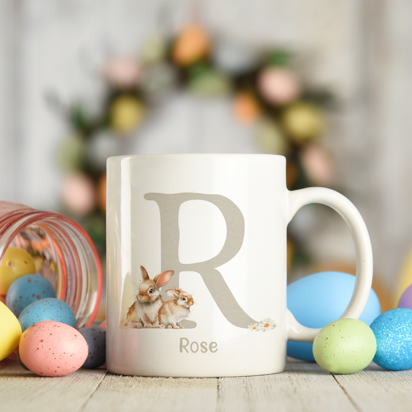 Ceramic mug featuring an alphabet personalised design with a cute bunny rabbit, letter R