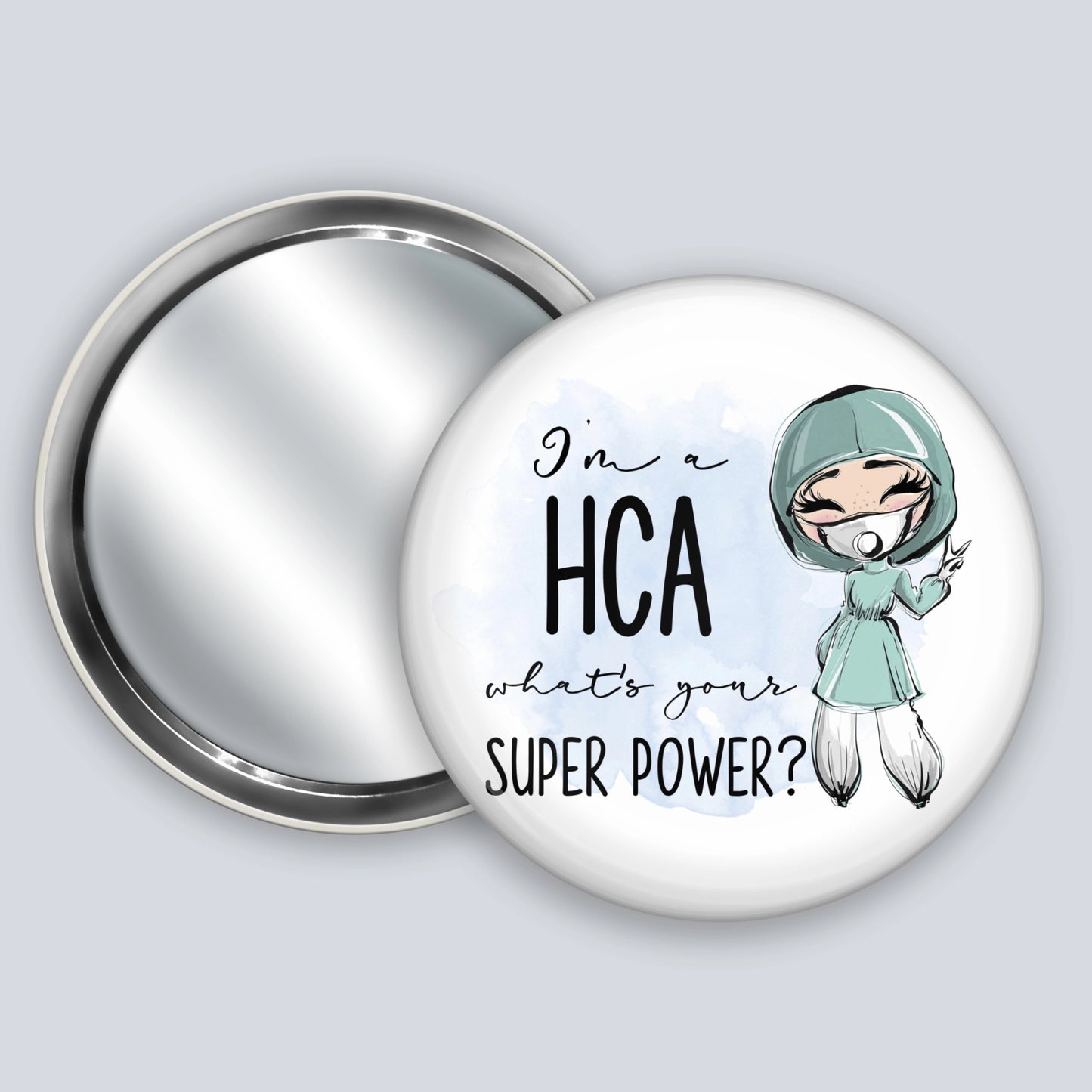 Handheld badge mirror featuring a fair skinned medic and the words I'm a hca what's your super power?