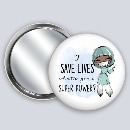 Handheld badge mirror featuring a dark skinned medic and the words I save lives what's your super power?