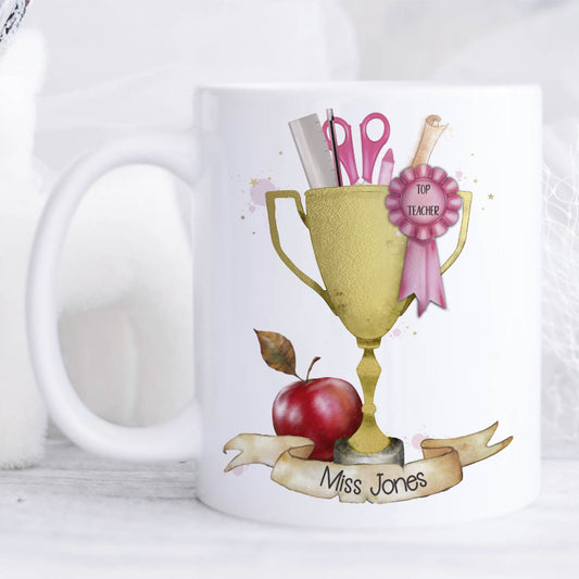 Personalised Top Teacher trophy mug in pink.