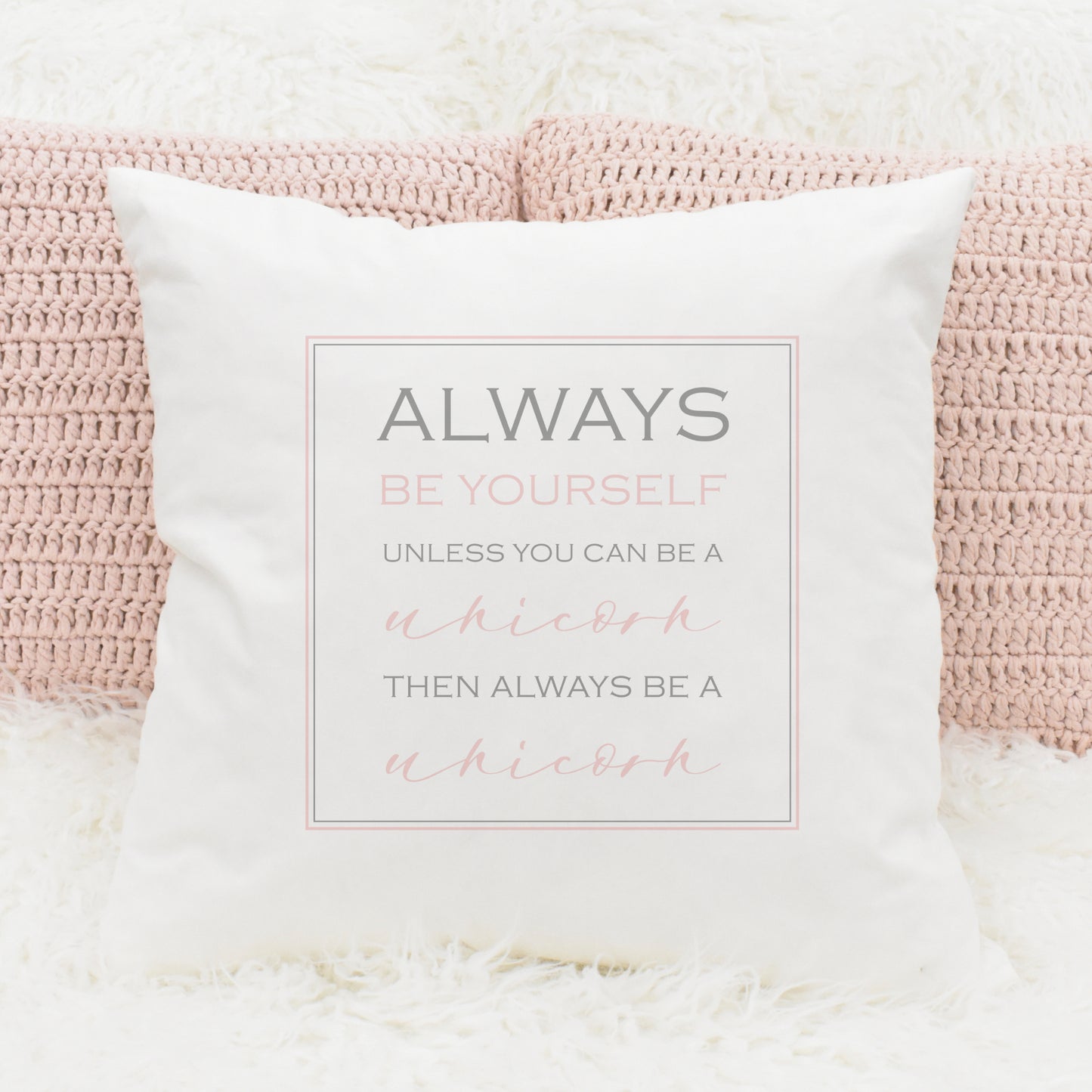 Square cushion with always be yourself unless you can be a unicorn printed on it.