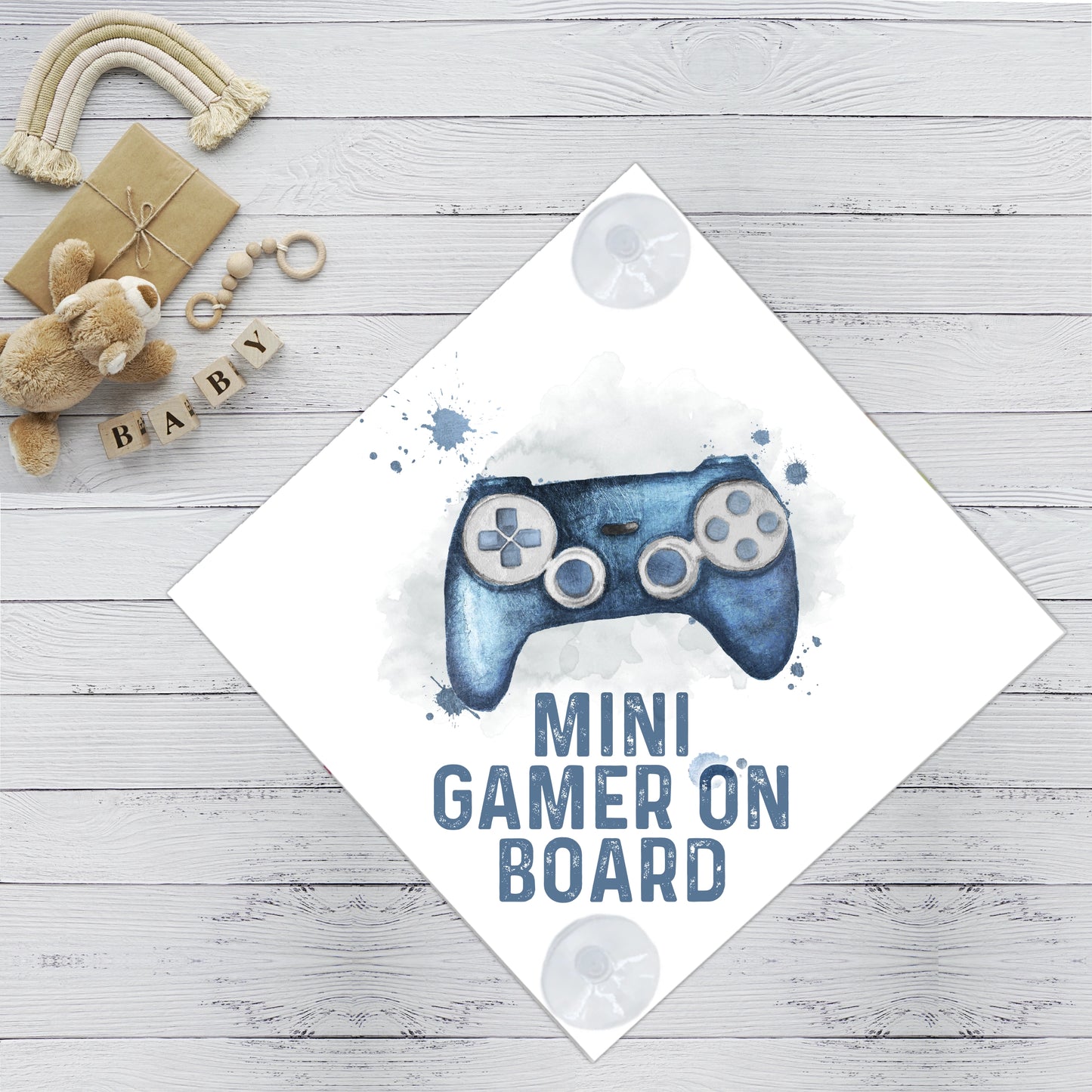 Baby on board sign featuring a blue gaming design