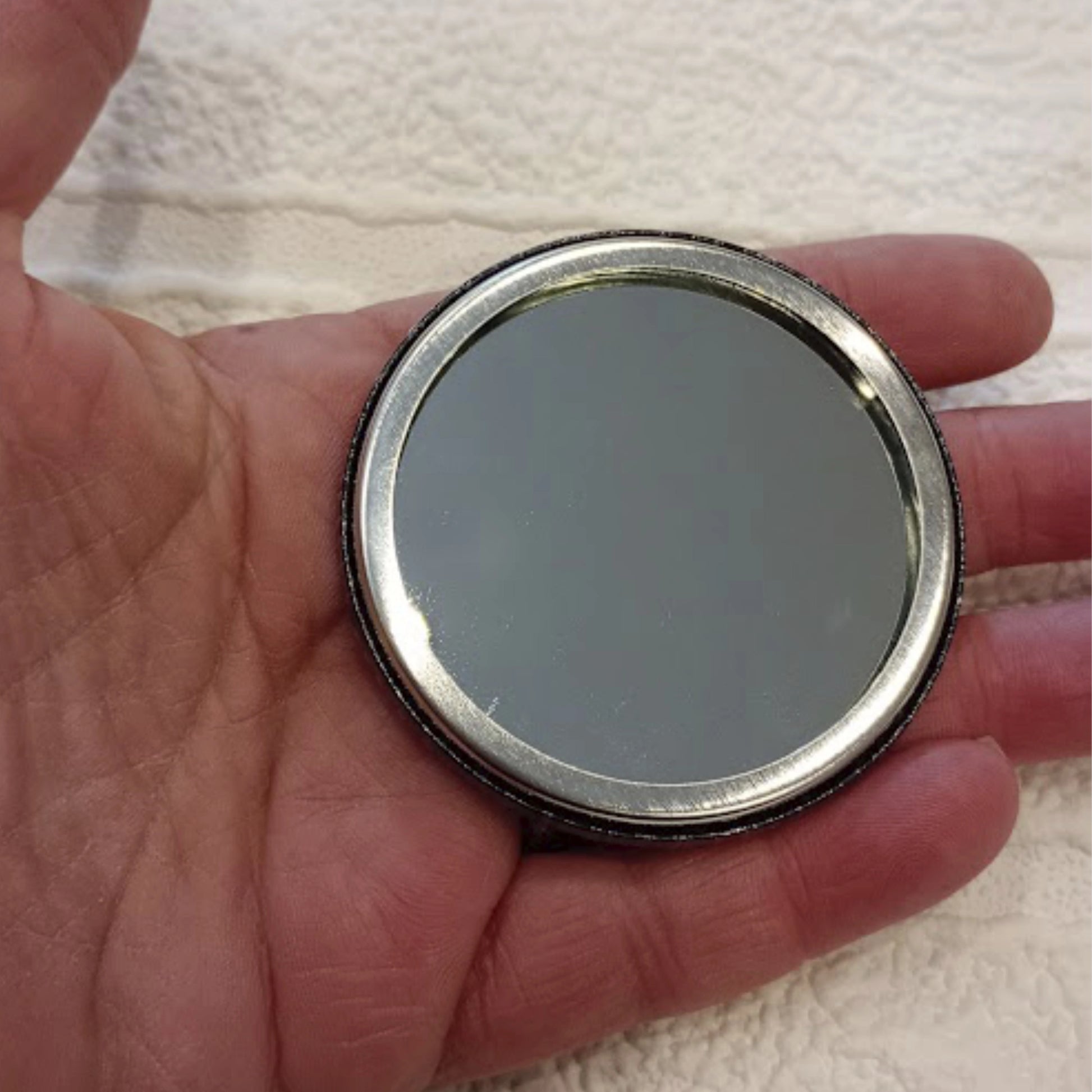 Image showing the mirror of the handheld badge mirror