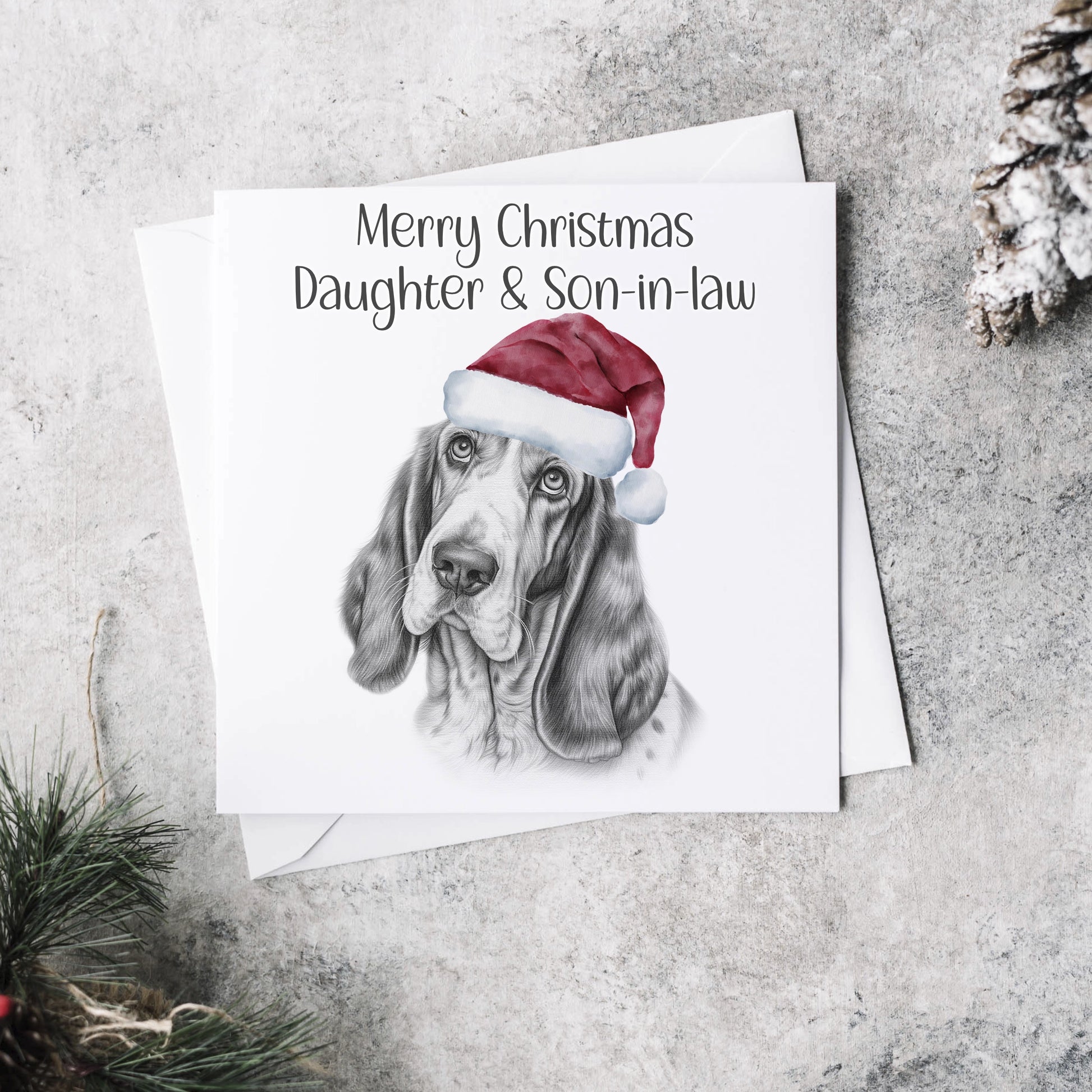 Personalised Christmas card featuring the sketch of a Basset dog wearing a Christmas hat