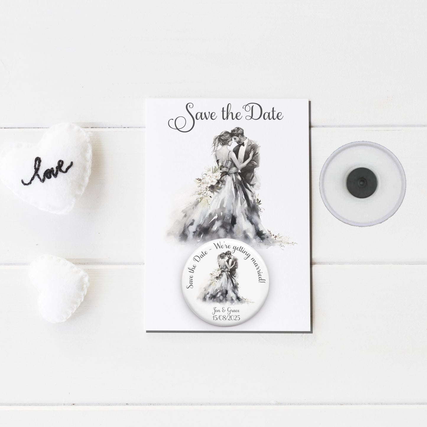 Save the date badge mirror featuring an image of a bride and groom and personalised with names and wedding date badge on a backing card with the same design