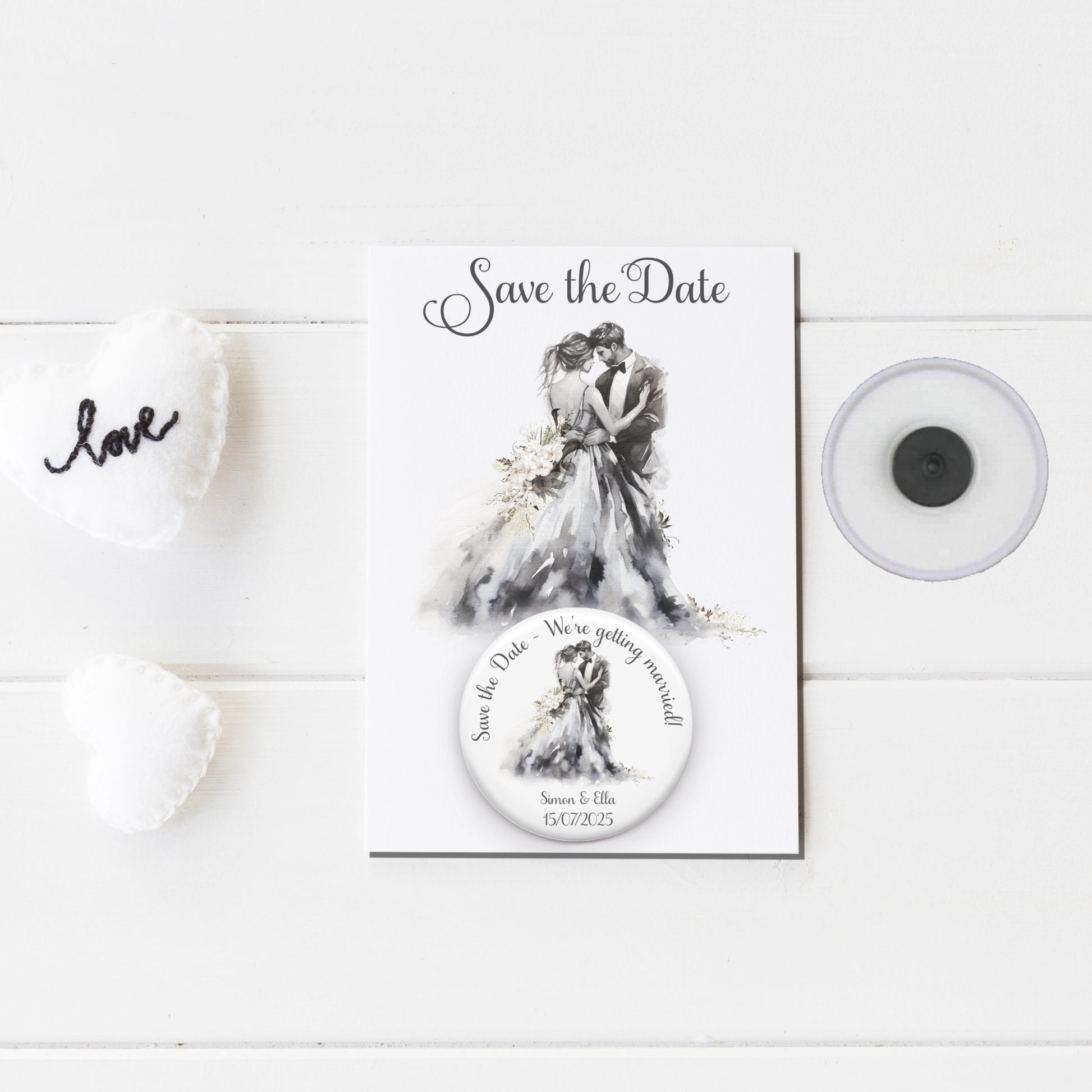 Save the date badge mirror featuring an image of a bride and groom and personalised with names and wedding date badge on a backing card with the same design