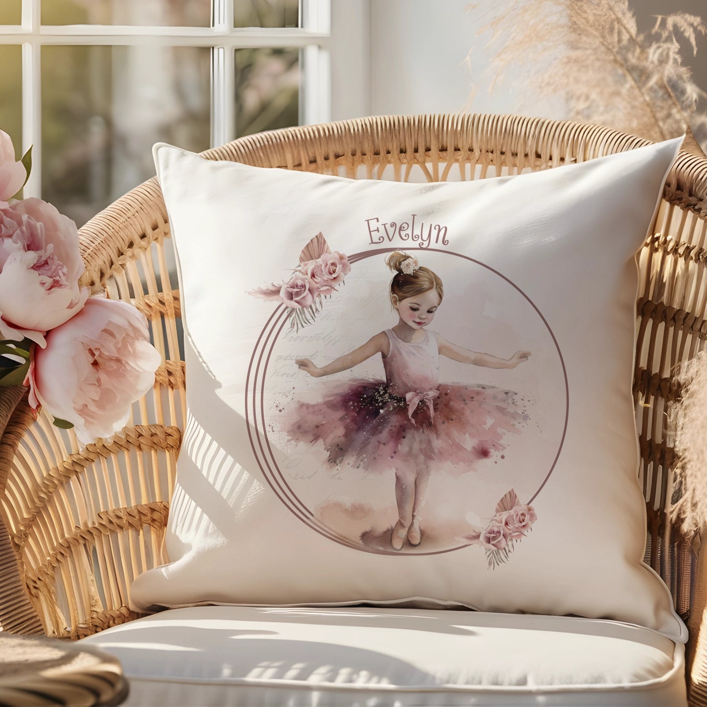 Cushion with a picture of a dancing ballerina in a burgundy tutu with a floral wreath and personalised with the name Evelyn