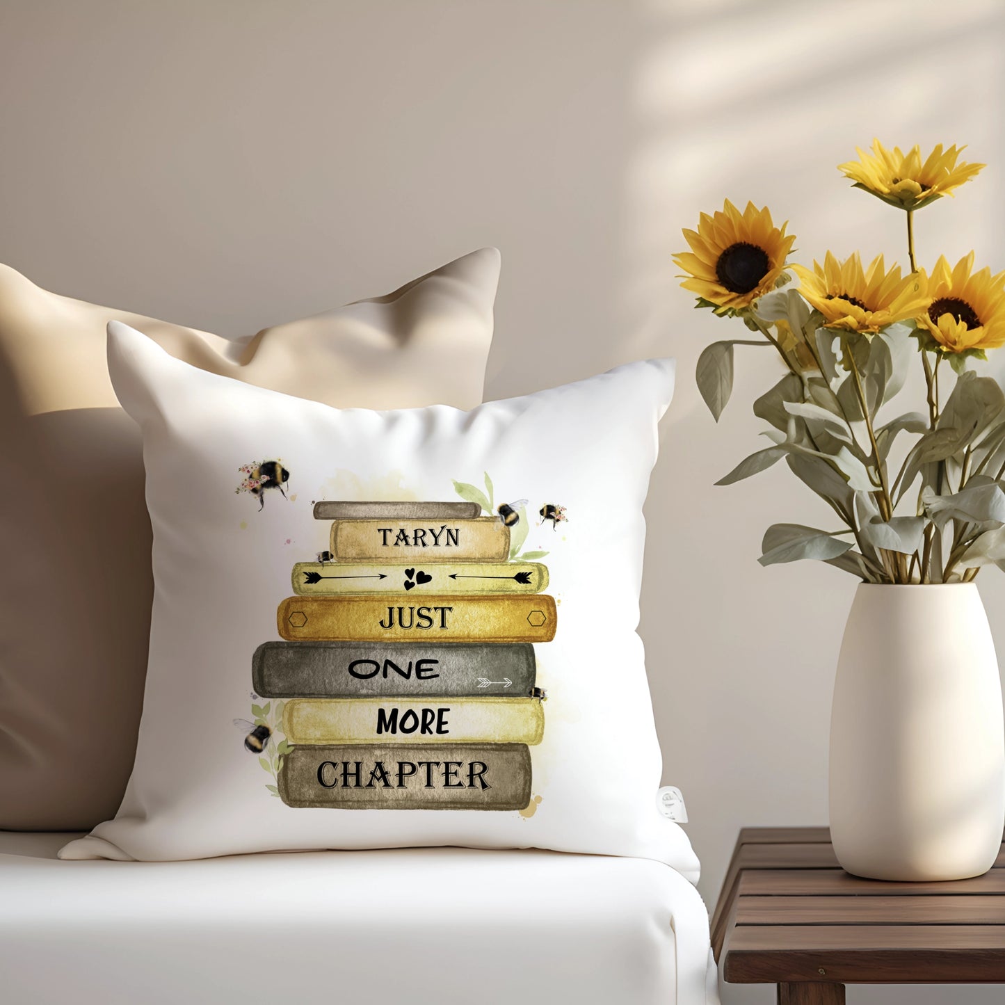 bumble bee book stack design personalised cushion with the quote 'just one more chapter'