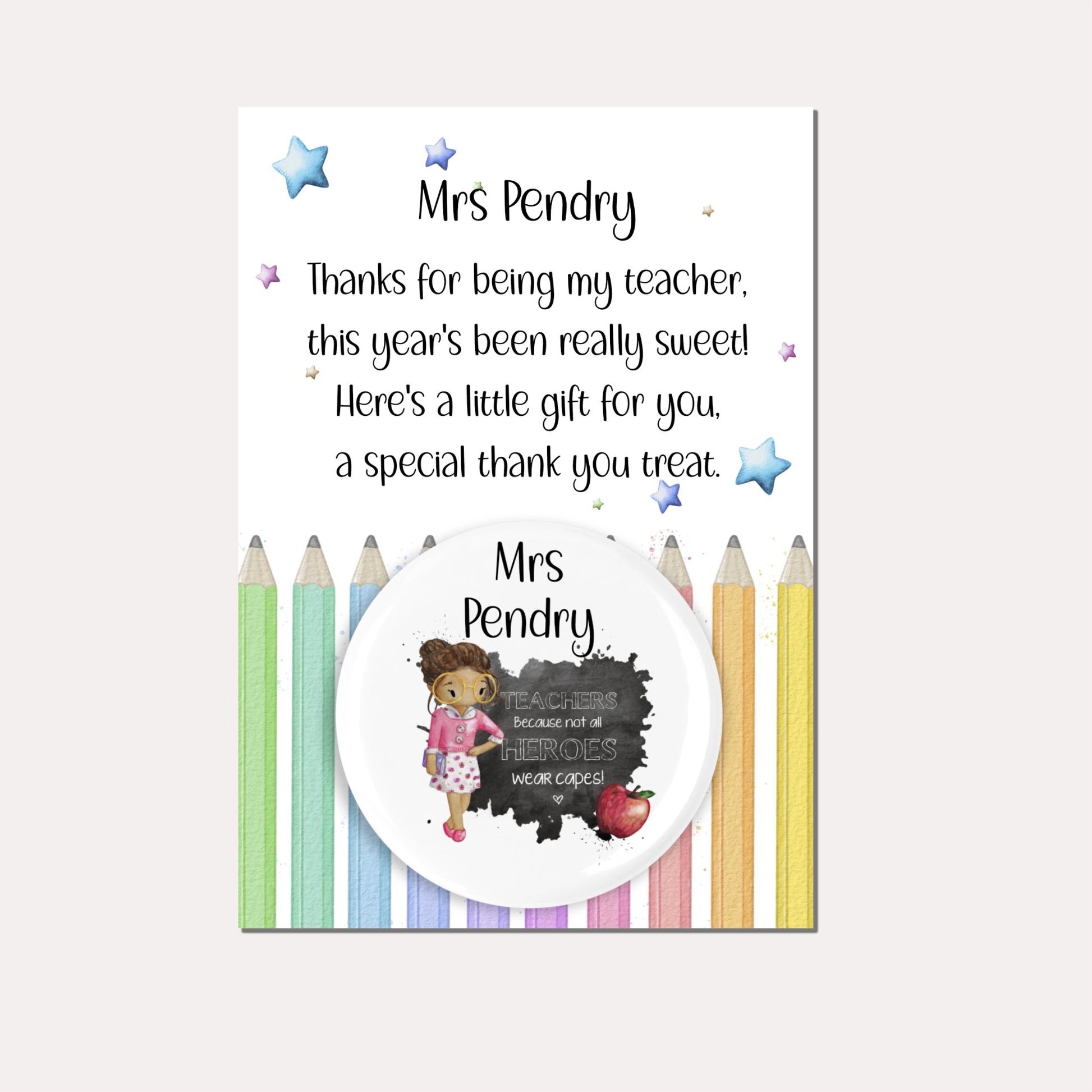 Personalised badge featuring a female teacher and an apple with the quote 'Teachers because not all heroes wear capes!' on a backing card with a pencil design and a poem.