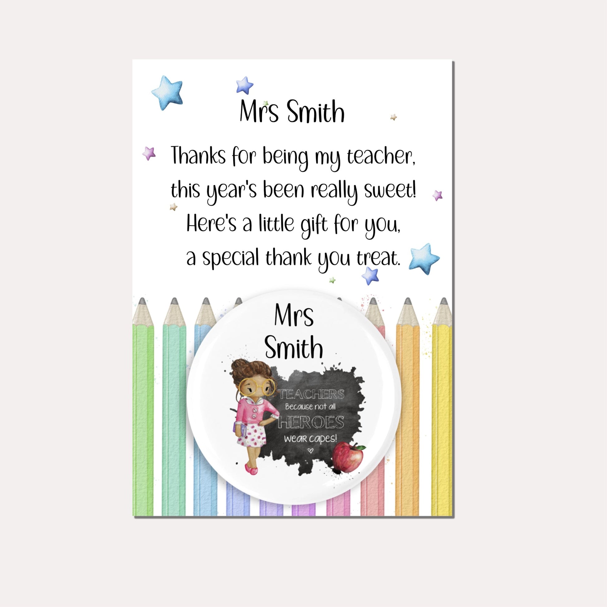 Personalised badge featuring a female teacher and an apple with the quote 'Teachers because not all heroes wear capes!' on a backing card with a pencil design and a poem.