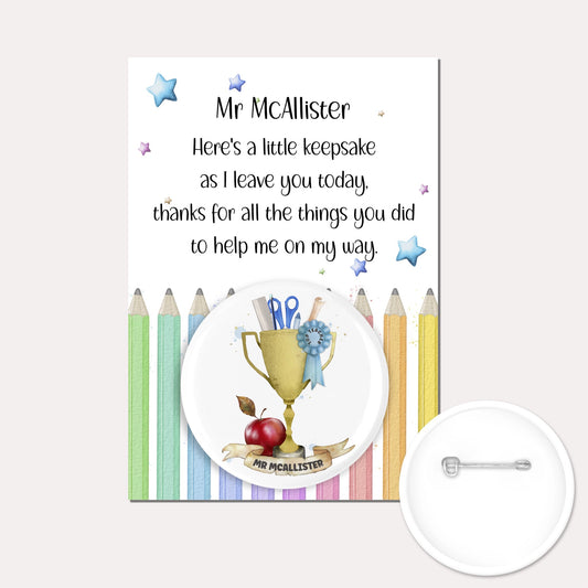 Personalised badge featuring the image of a trophy with a blue rosette and placed on a backing card with a pencil design and a poem. 