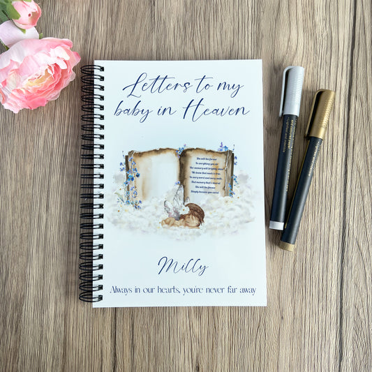 A5 memorial journal with an image of an angel baby on a book and personalised