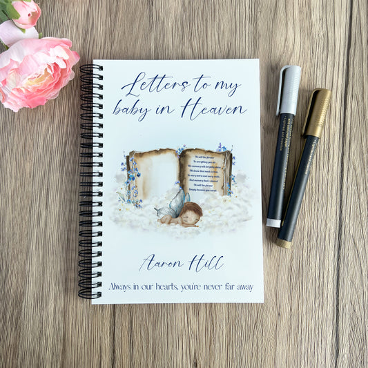 A5 memorial notebook featuring an angel baby boy on a book and personalised