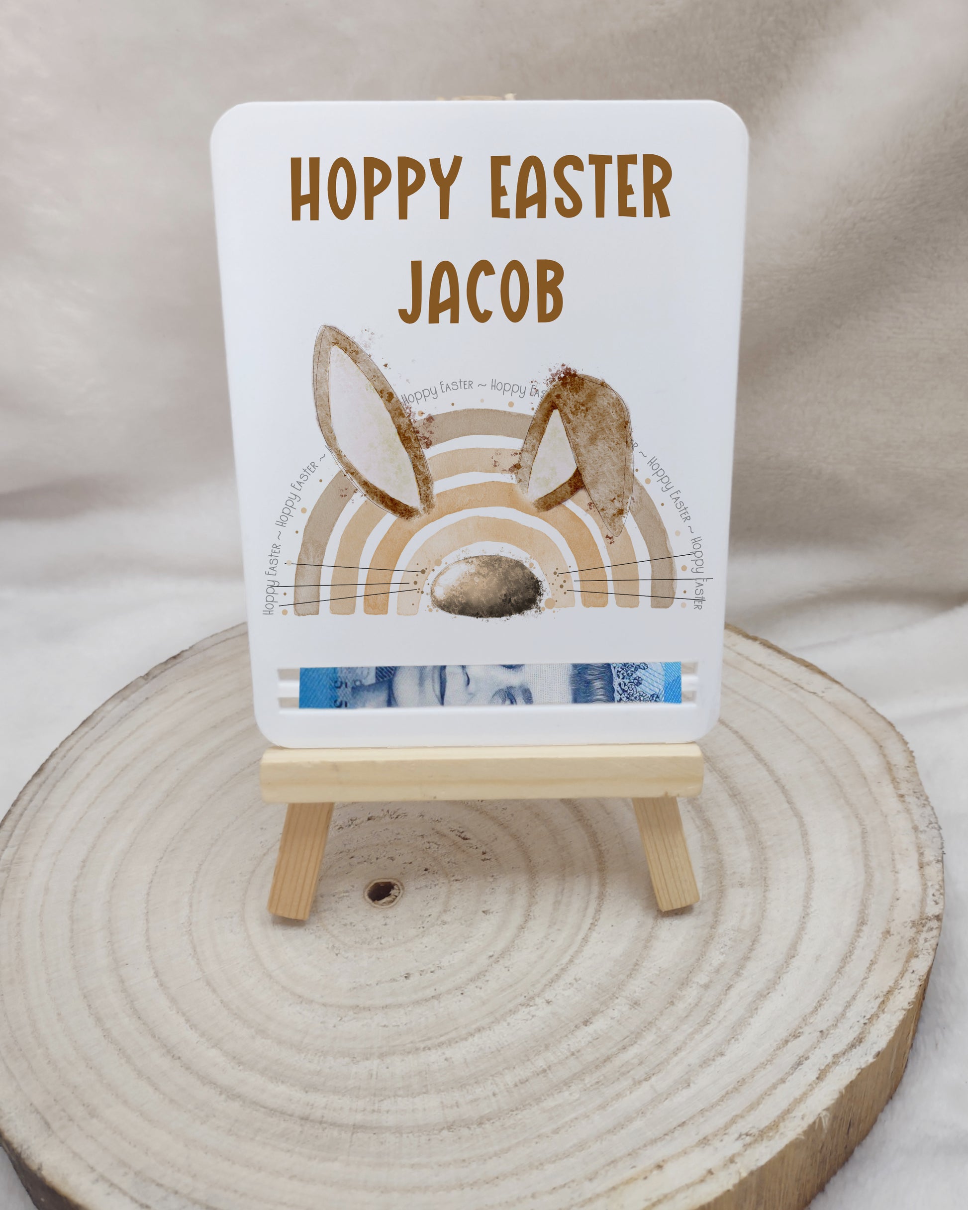 Personalised acrylic money holder with a brown rainbow  and bunny ears