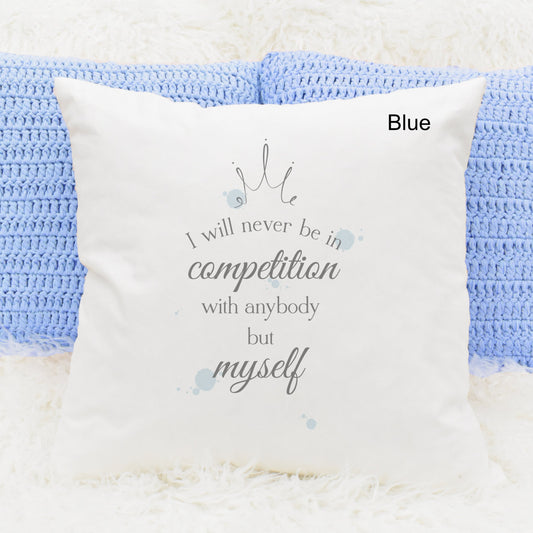 Square cushion featuring blue watercolour splodges and a crown with the text 'I will never be in competition with anybody but myself'
