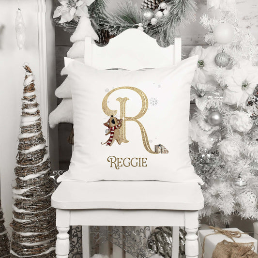 Square cushion with inner featuring a gold alphabet, cute sleepy mice and wrapped gifts with personalised text