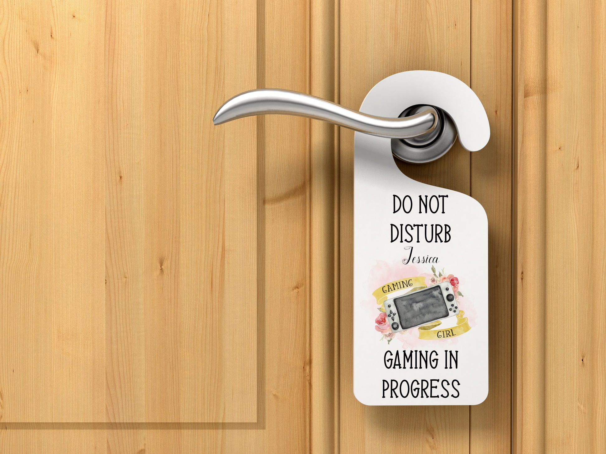Aluminium door hanger featuring a watercolour floral gaming design and the text 'Do not disturb, gaming in progress' can be personalised. three different controller options 