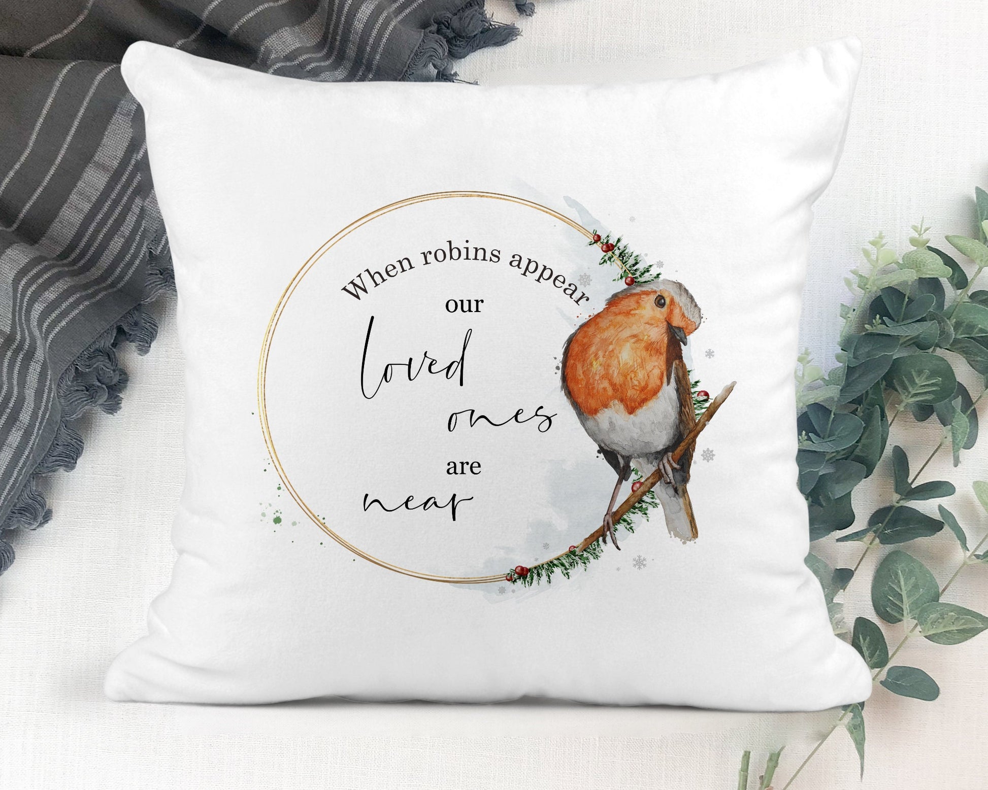 Square cushion with inner, red robin in a wreath, robins appear when loved ones are near