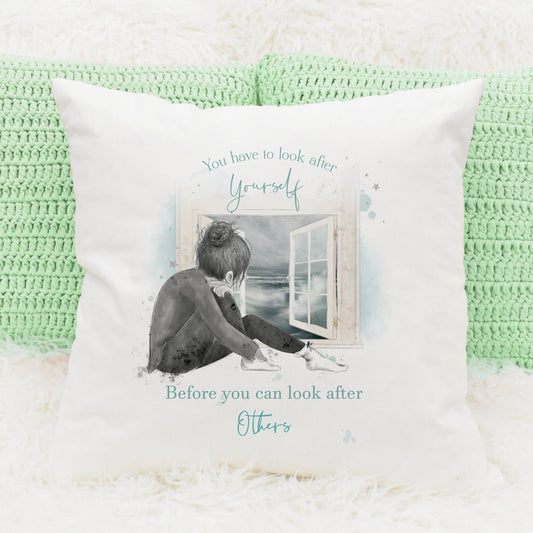 Square cushion with inner, design of a girl looking out of the window being contemplative. 