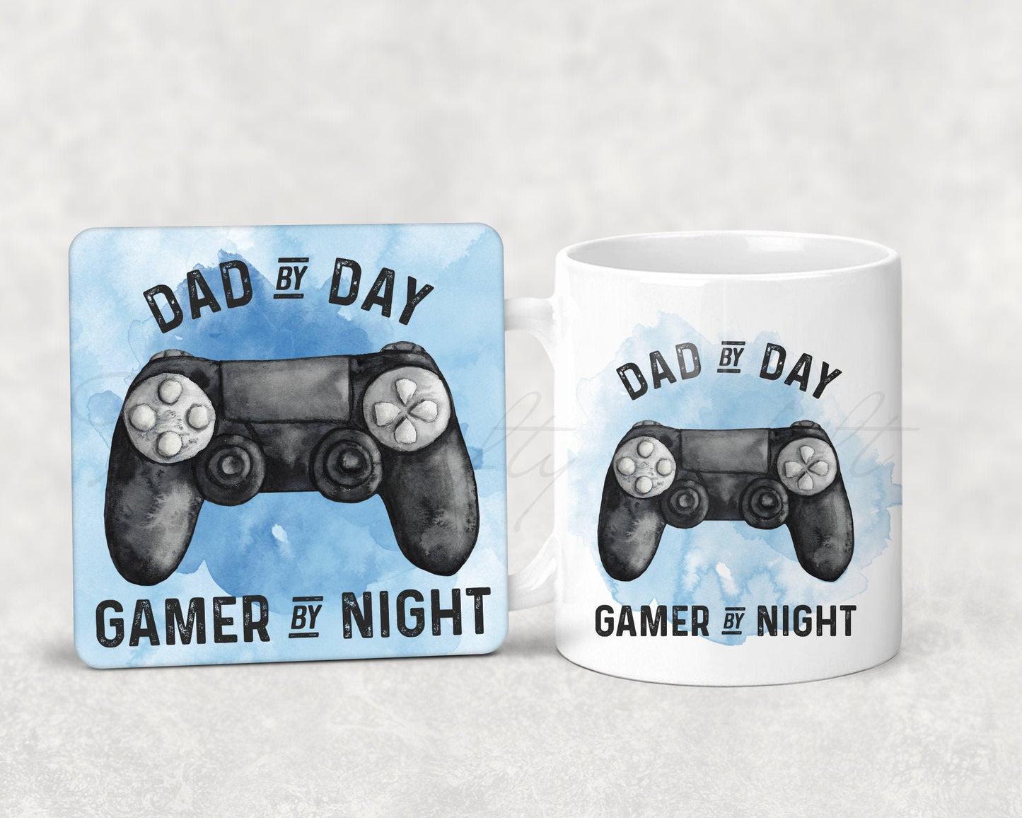 Mug and coaster set featuring a gaming design with text that reads 'dad by day, gamer by night' in blue