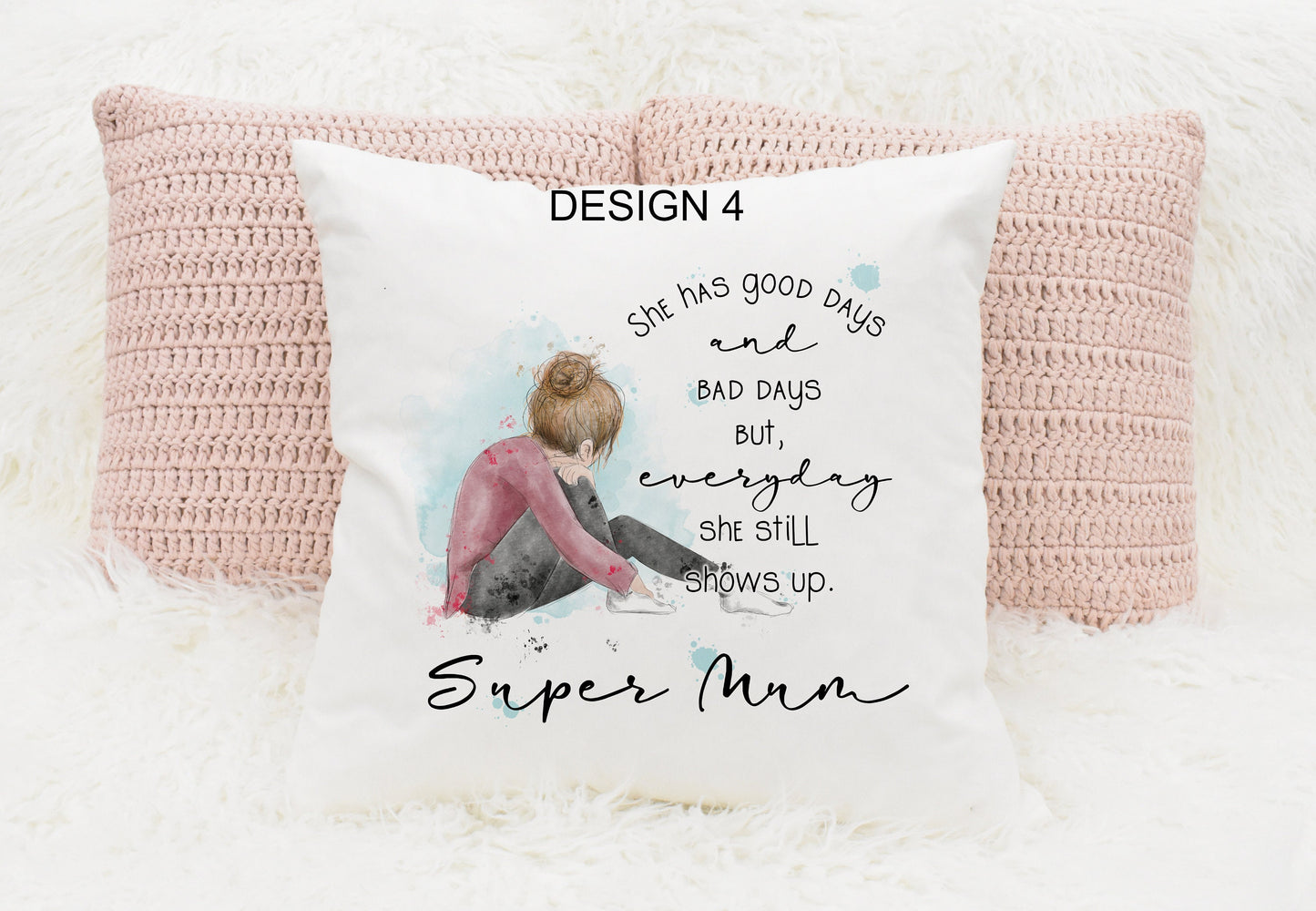 Square cushion featuring a watercolour design of a girl sitting down. Text reads 'She has good days and bad days but everyday she still shows up. Can be personalised.