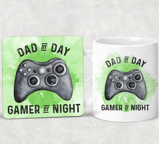 Mug and coaster set featuring a gaming design with text that reads 'dad by day, gamer by night' in green