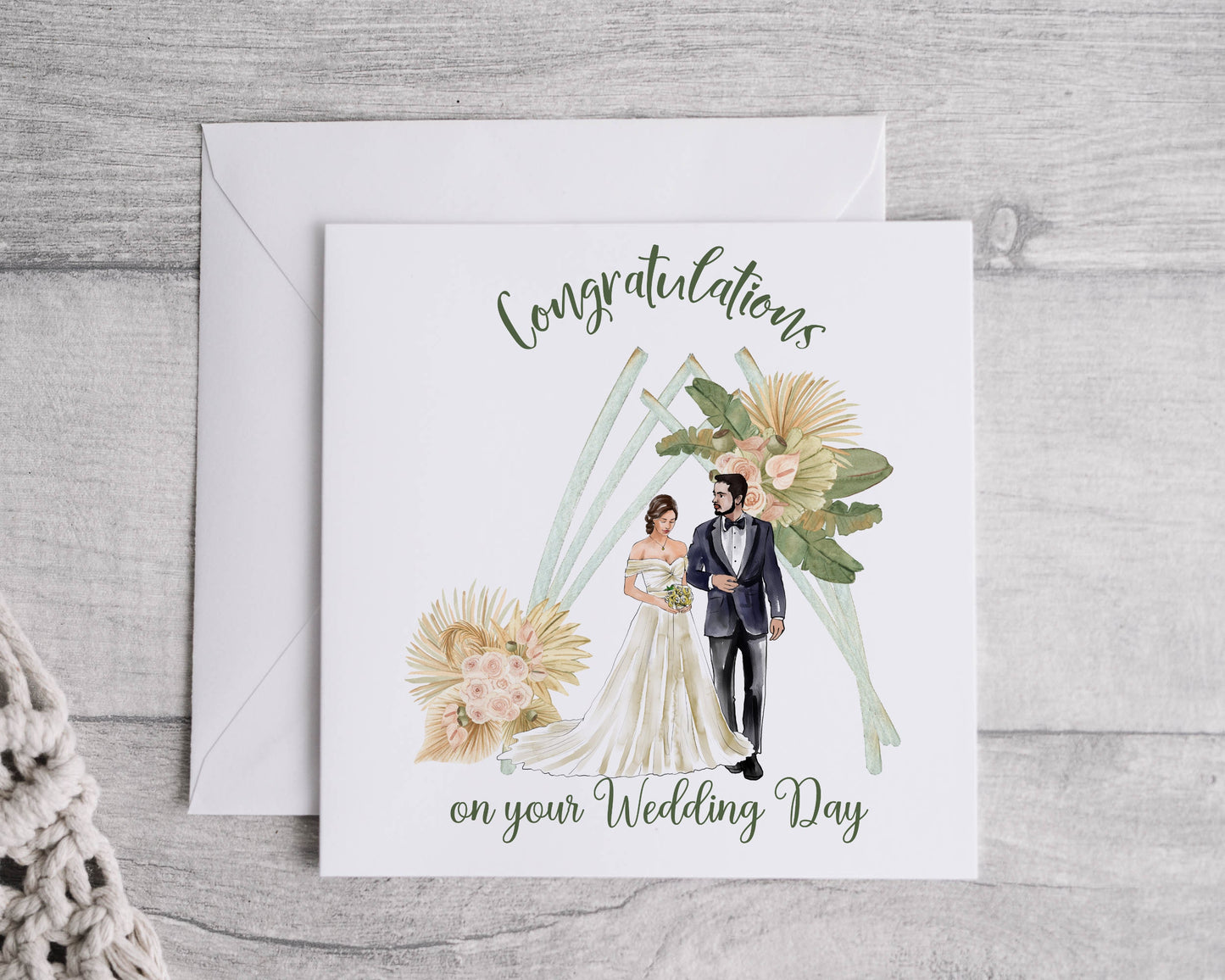 Wedding congratulations card featuring a bride and groom under a boho arch and personalised text