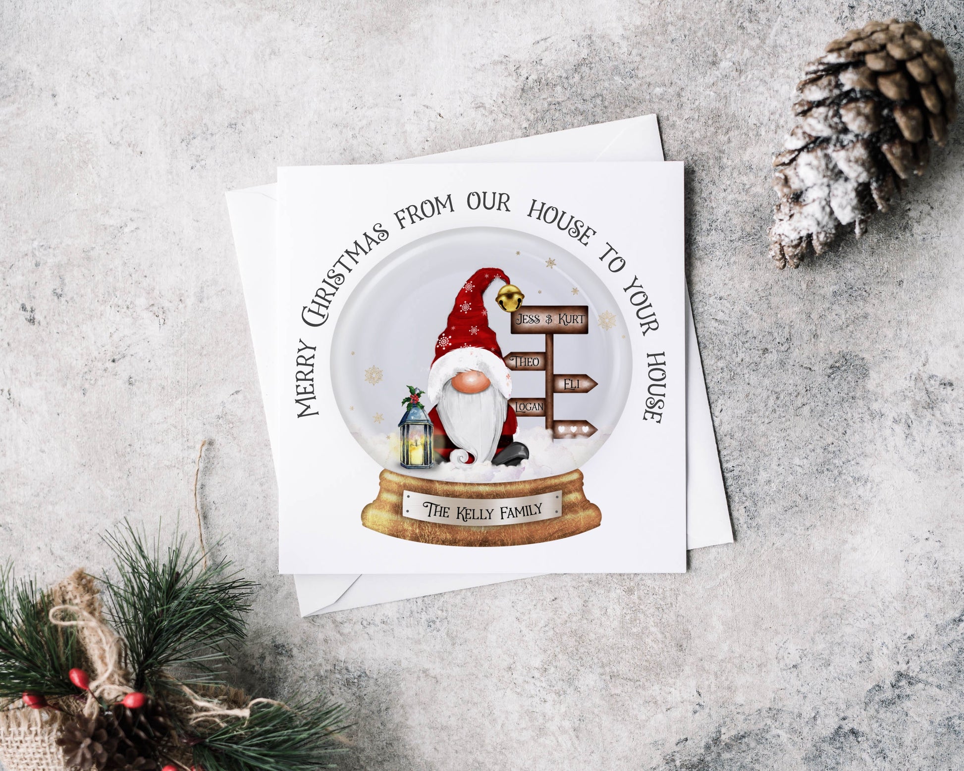 Christmas greeting card featuring Santa with a signpost and a lantern within a snowglobe, text can be personalised