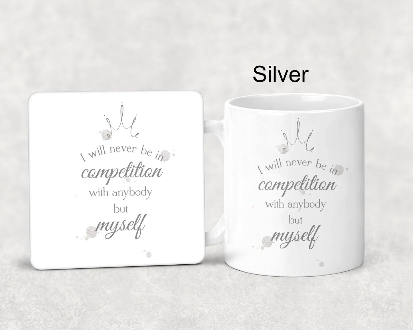 Mug and coaster set featuring a crown and a watercolour splodge design in silver with the text 'I will never be in competition with anybody but myself' 
