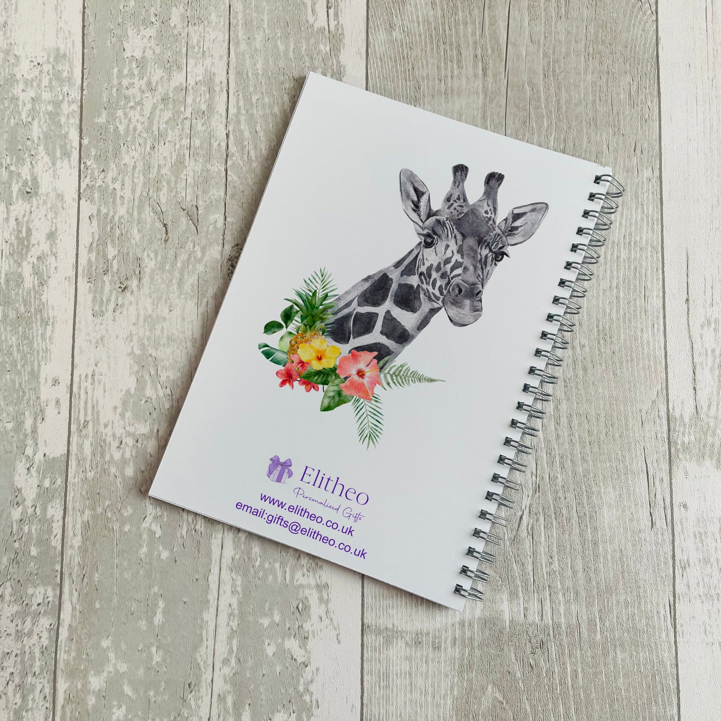 personalised notebook featuring a giraffe in flowers