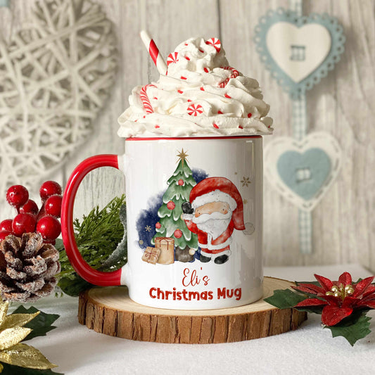 Red handled Christmas mug with the image of Santa and Christmas tree, personalised with the name Eli