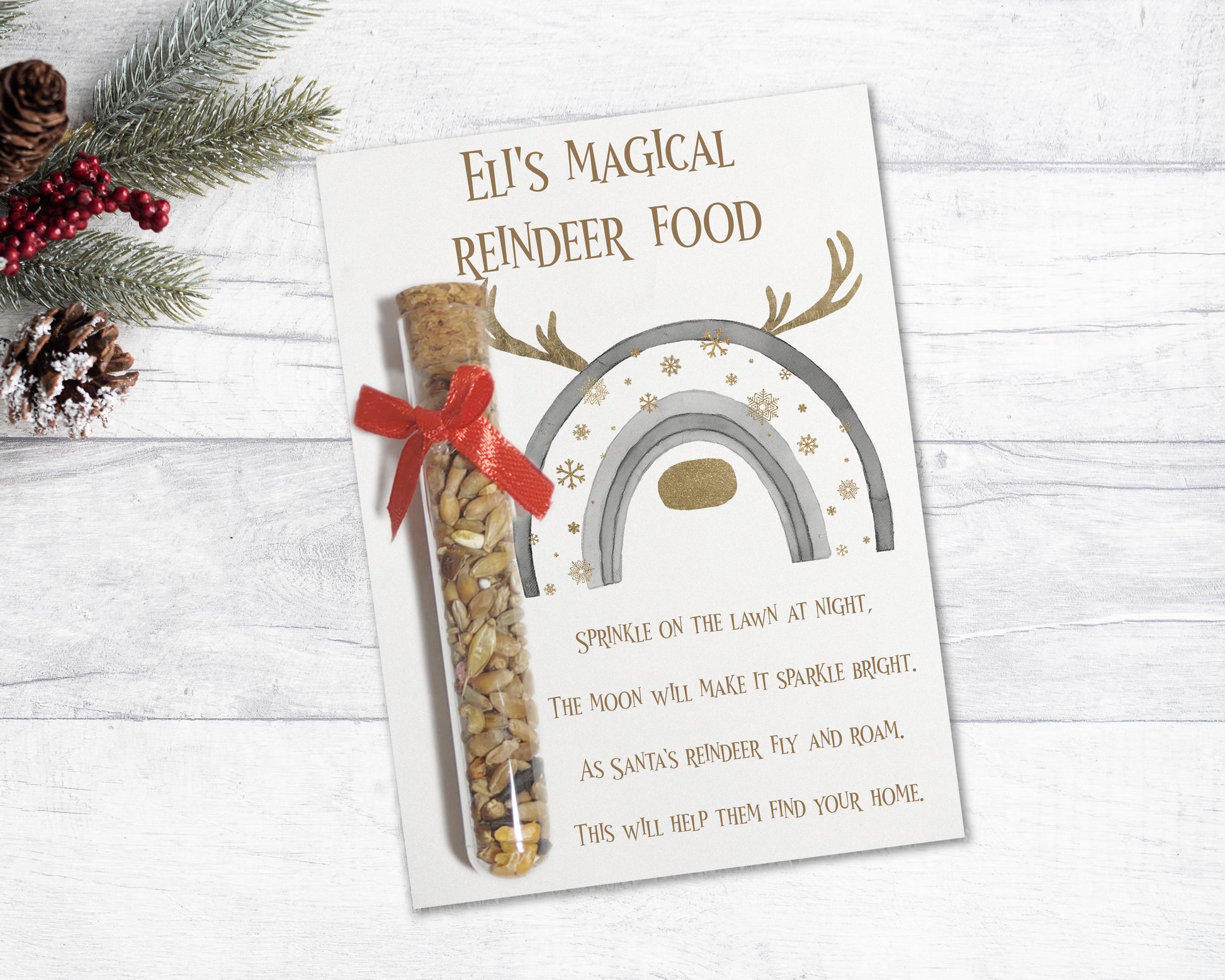Reindeer food, wild bird seed in a plastic corked tube on a card backing with a silver and gold antler design and poem. Can be personalised