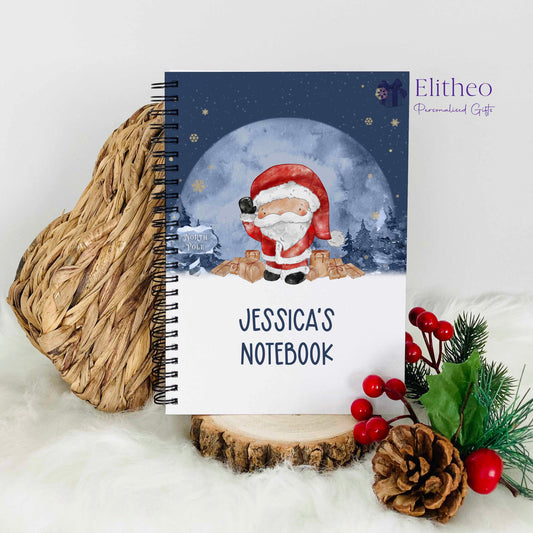 A5 notebook with an image of Santa Claus in the north pole and is personalised